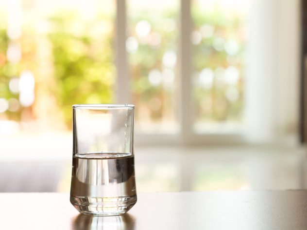 closeup Glass of water on table in the living room